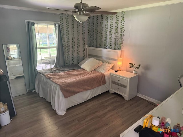 4912 Evergreen Ln, Victoria, TX 77904 - bedroom featuring dark wood-style floors and ceiling fan