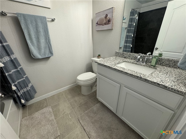 bathroom with vanity, tile patterned flooring, toilet, and a shower with curtain