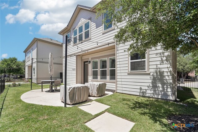 13900 Zink Bnd Unit 61, Austin, TX 78717 - rear view of house featuring a patio