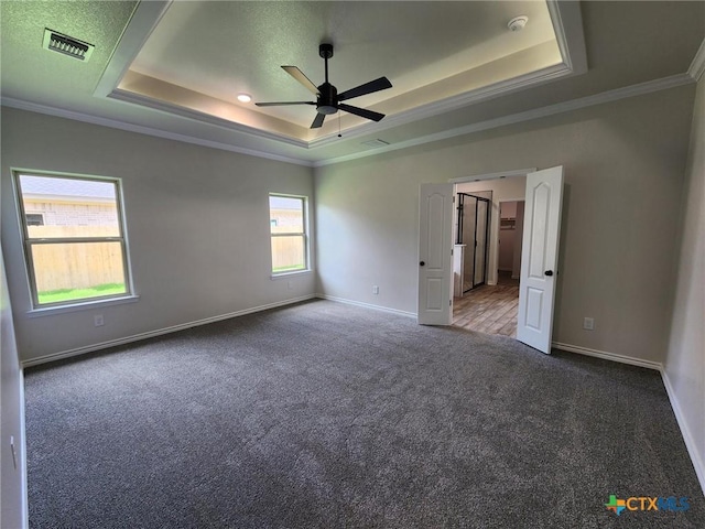 719 Eagle Claw Dr, Salado, TX 76571 - unfurnished bedroom with a raised ceiling, carpet flooring, ornamental molding, and baseboards