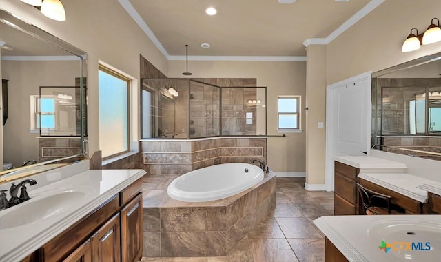 full bath with crown molding, tiled shower, a sink, and a garden tub