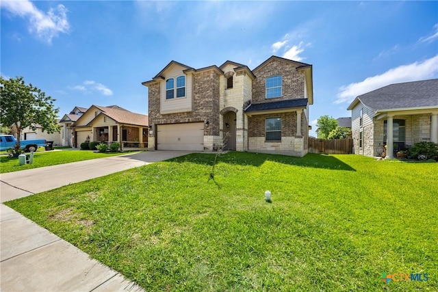 5920 Stonehaven Dr, Temple, TX 76502 - view of front of home with driveway, brick siding, an attached garage, and stone siding