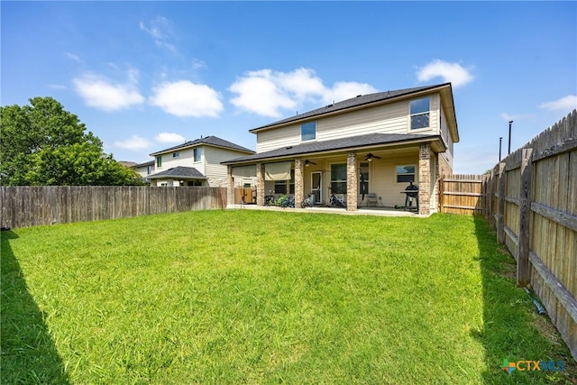 5920 Stonehaven Dr, Temple, TX 76502 - back of property featuring ceiling fan, a patio area, and brick siding