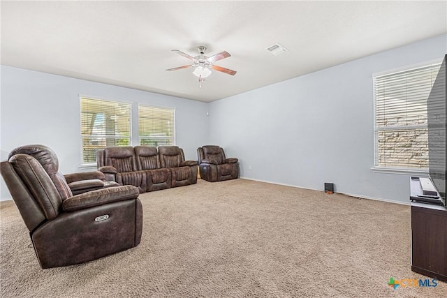 5920 Stonehaven Dr, Temple, TX 76502 - carpeted living area with a ceiling fan and baseboards