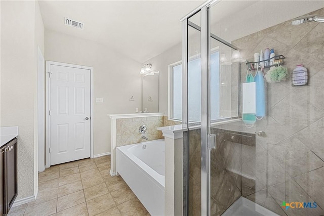 5920 Stonehaven Dr, Temple, TX 76502 - full bath featuring vanity, a stall shower, a garden tub, tile patterned flooring, and baseboards