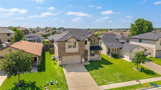 5920 Stonehaven Dr, Temple, TX 76502 - view of front of house with a residential view, stone siding, and driveway