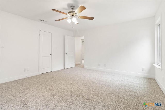 unfurnished bedroom with carpet floors and ceiling fan