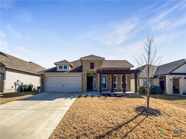 view of front of property with a garage