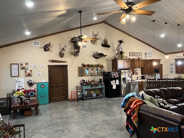 interior space featuring ornamental molding, concrete flooring, lofted ceiling, and ceiling fan