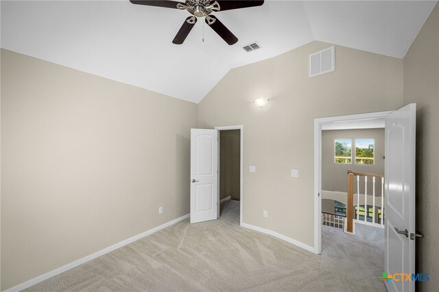 171 Clear Rdg, New Braunfels, TX 78132 - unfurnished bedroom with vaulted ceiling, visible vents, baseboards, and light carpet