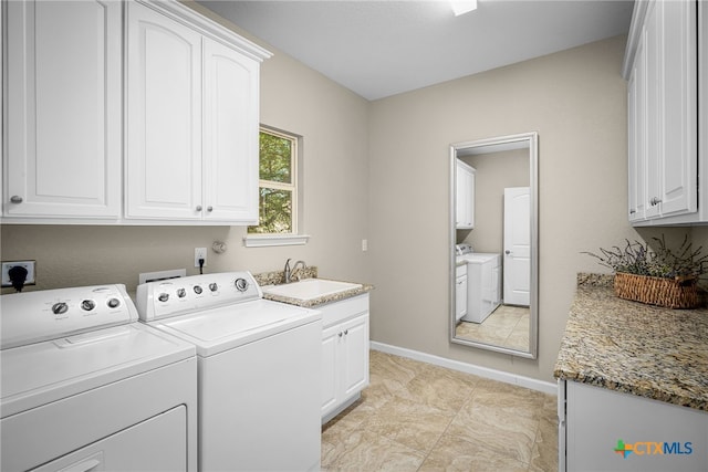 171 Clear Rdg, New Braunfels, TX 78132 - clothes washing area with separate washer and dryer, baseboards, a sink, and cabinet space