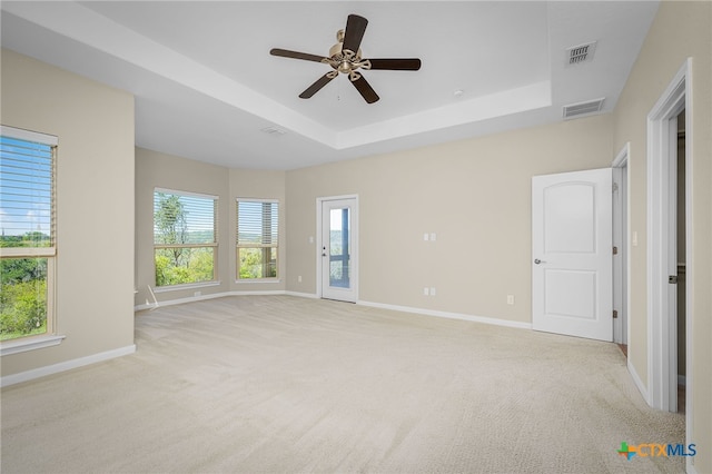 171 Clear Rdg, New Braunfels, TX 78132 - empty room featuring light carpet, baseboards, visible vents, and a raised ceiling