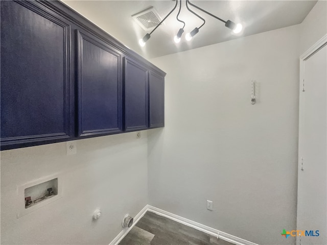 washroom featuring washer hookup, cabinets, and gas dryer hookup