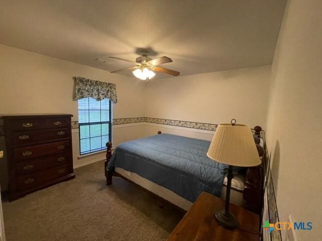 bedroom featuring carpet floors and a ceiling fan