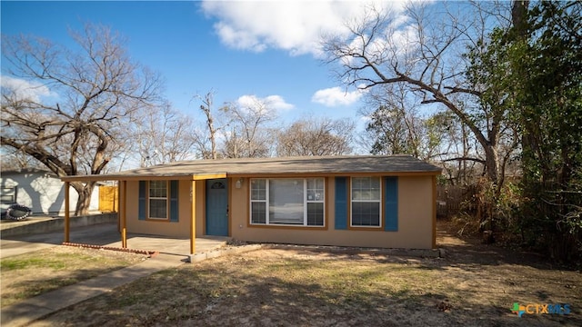 view of front of property featuring a patio area