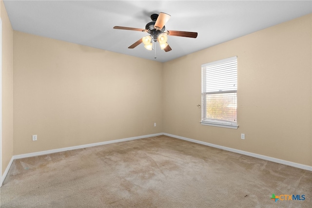 carpeted empty room with ceiling fan