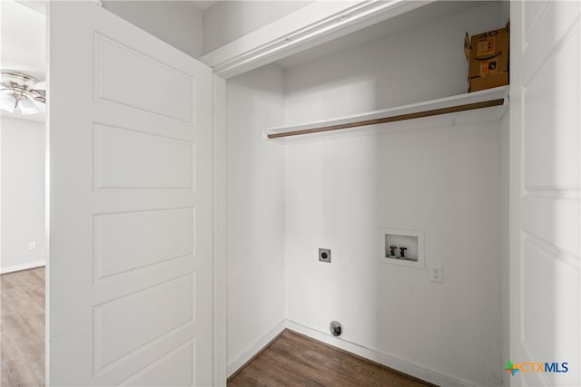 laundry room with hookup for an electric dryer, dark wood-type flooring, washer hookup, and laundry area