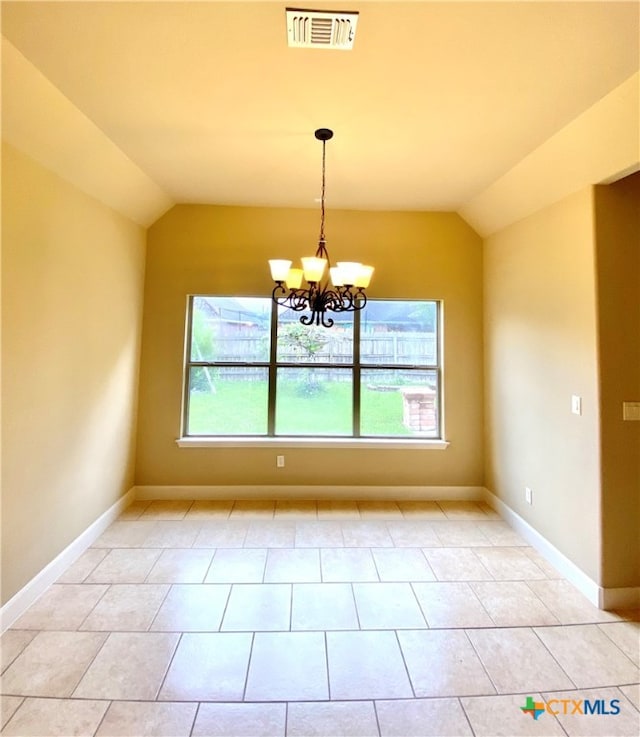 unfurnished dining area featuring a chandelier, vaulted ceiling, and light tile patterned floors