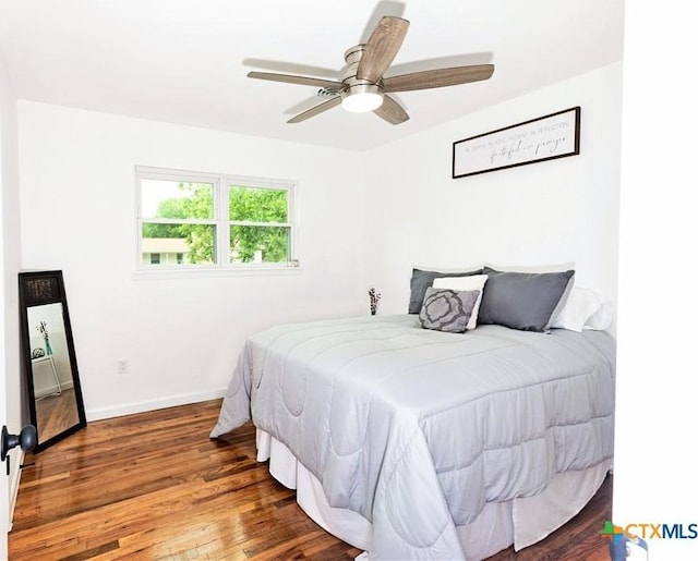 2111 Brantley Ave, Copperas Cove, TX 76522 - bedroom with wood finished floors, baseboards, and a ceiling fan