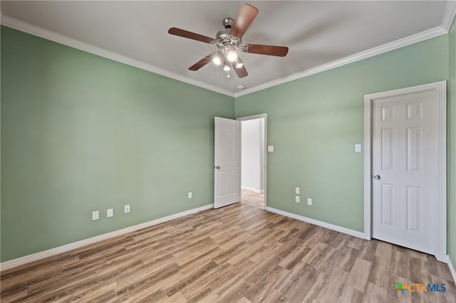 5905 Turtle Creek Trl, Temple, TX 76502 - unfurnished bedroom with wood finished floors, baseboards, ornamental molding, and ceiling fan