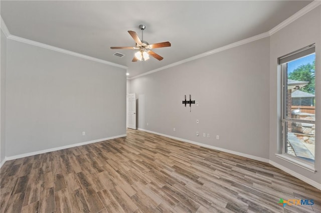 5905 Turtle Creek Trl, Temple, TX 76502 - unfurnished room with wood finished floors, a ceiling fan, baseboards, and crown molding