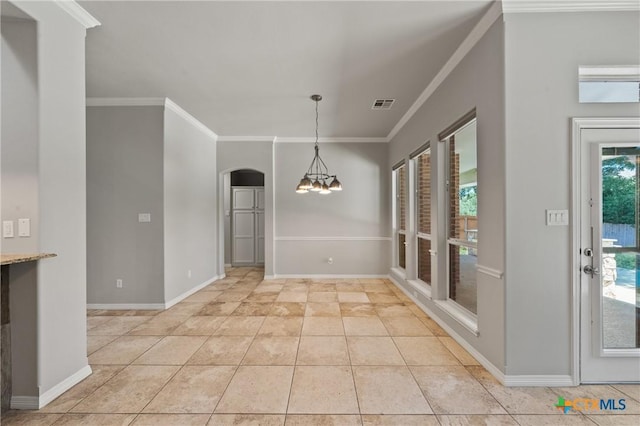 5905 Turtle Creek Trl, Temple, TX 76502 - unfurnished dining area featuring ornamental molding, a chandelier, arched walkways, light tile patterned floors, and baseboards