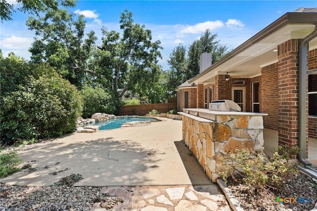 5905 Turtle Creek Trl, Temple, TX 76502 - view of patio / terrace featuring an outdoor kitchen