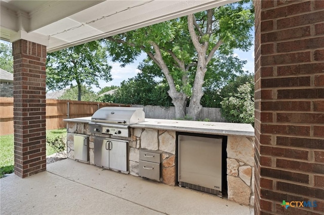 5905 Turtle Creek Trl, Temple, TX 76502 - fenced backyard featuring a patio area
