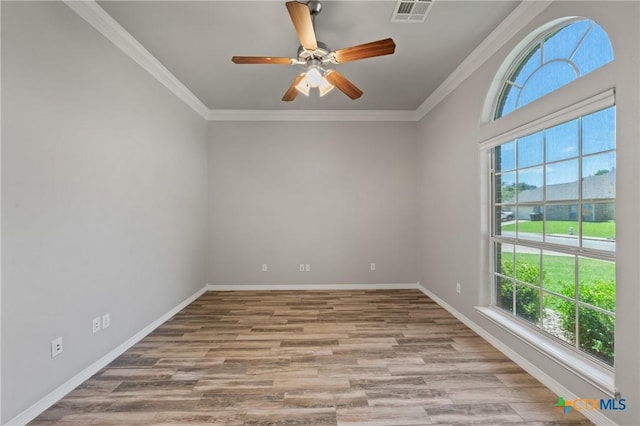 5905 Turtle Creek Trl, Temple, TX 76502 - spare room with healthy amount of natural light, baseboards, crown molding, a ceiling fan, and wood finished floors