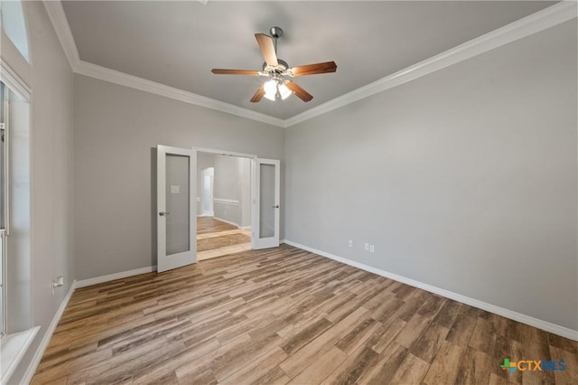 5905 Turtle Creek Trl, Temple, TX 76502 - unfurnished bedroom with french doors, wood finished floors, baseboards, crown molding, and a ceiling fan