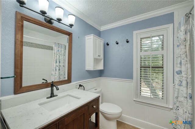 1506 Spiderlily Vw, Cedar Park, TX 78613 - bathroom featuring a textured ceiling, vanity, ornamental molding, toilet, and a shower with shower curtain