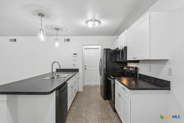 kitchen with black range with electric cooktop, dishwasher, dark countertops, a sink, and a peninsula
