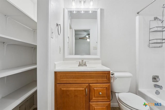 full bathroom featuring shower / washtub combination, vanity, toilet, and a ceiling fan