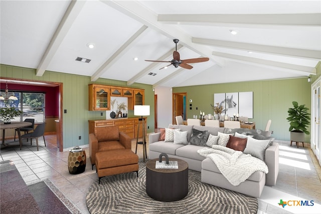 living room with vaulted ceiling with beams and ceiling fan