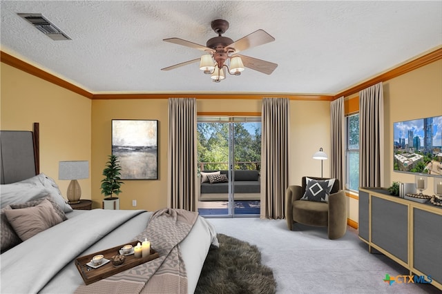 carpeted bedroom featuring ceiling fan, a textured ceiling, crown molding, and access to outside