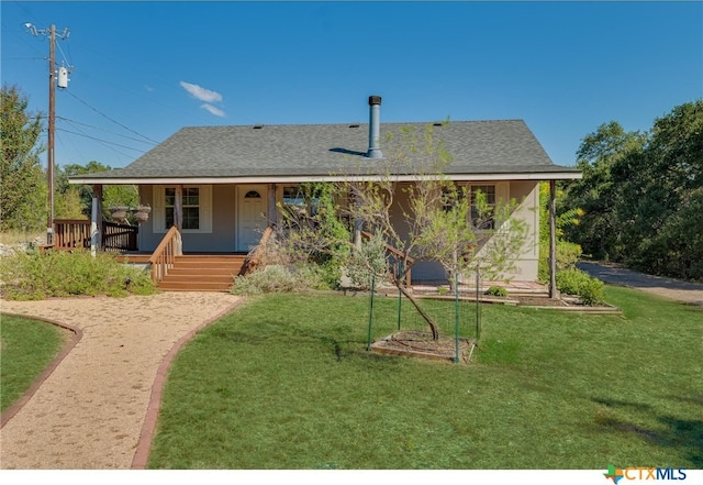 view of front facade with a front lawn and a porch