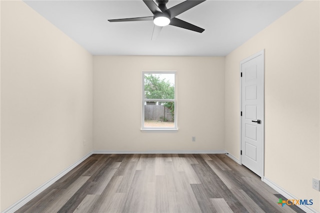 5224 Rose Garden Loop, Killeen, TX 76542 - empty room featuring wood finished floors, a ceiling fan, and baseboards