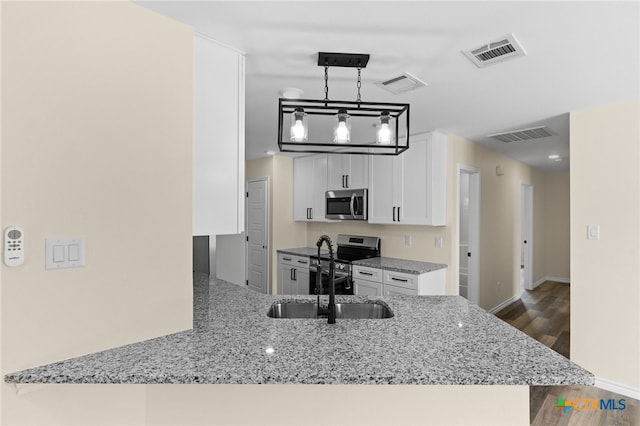 5224 Rose Garden Loop, Killeen, TX 76542 - kitchen featuring stainless steel appliances, a sink, light stone countertops, and white cabinetry