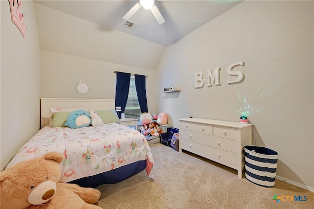 bedroom featuring ceiling fan, light carpet, and vaulted ceiling