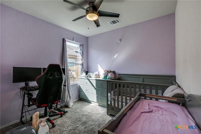 carpeted bedroom featuring ceiling fan