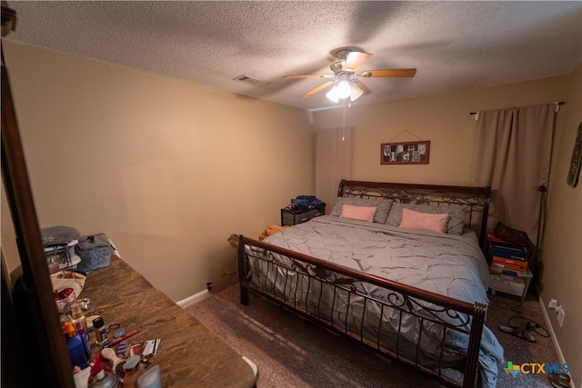 308 Fernwood Cir, Victoria, TX 77901 - bedroom with carpet flooring, a textured ceiling, and ceiling fan