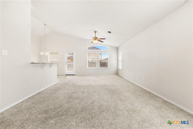 unfurnished living room featuring baseboards, visible vents, lofted ceiling, ceiling fan, and light colored carpet