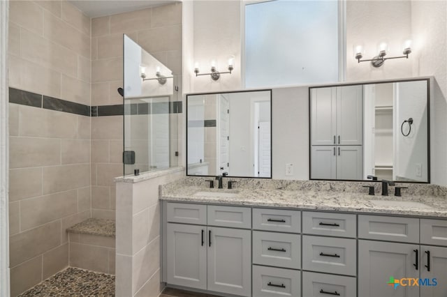 3006 Dew Drop, Horseshoe Bay, TX 78657 - bathroom with walk in shower and double vanity