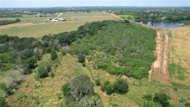 bird's eye view with a rural view and a water view