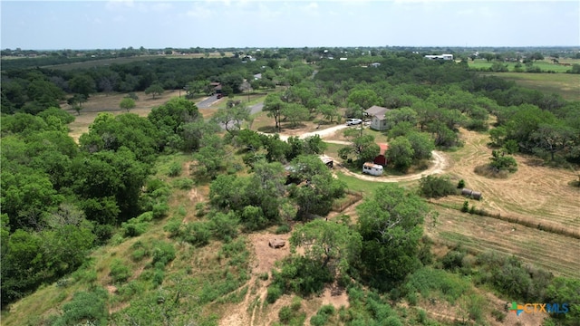 birds eye view of property featuring a rural view