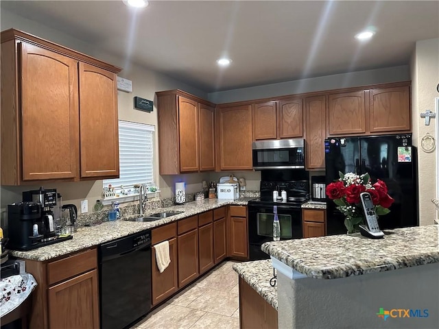334 Sorenstam Way, Cibolo, TX 78108 - kitchen featuring black appliances, a sink, light tile patterned flooring, light stone counters, and recessed lighting
