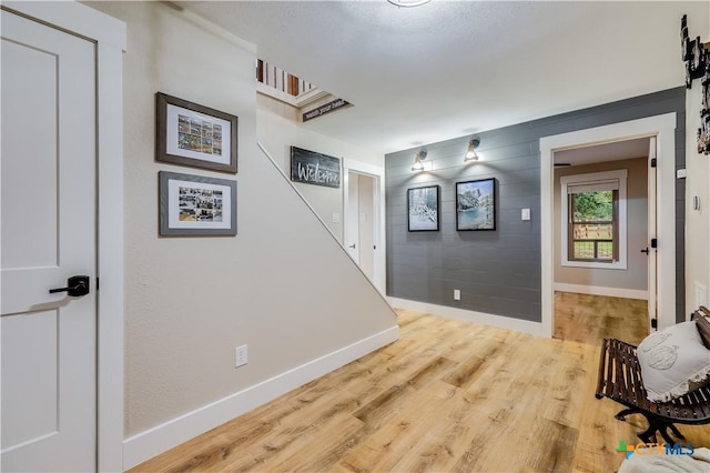 hallway featuring hardwood / wood-style flooring