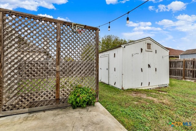 view of outbuilding featuring a lawn