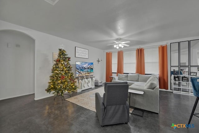 living room featuring ceiling fan