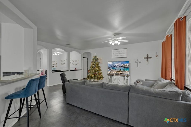 living room with ceiling fan